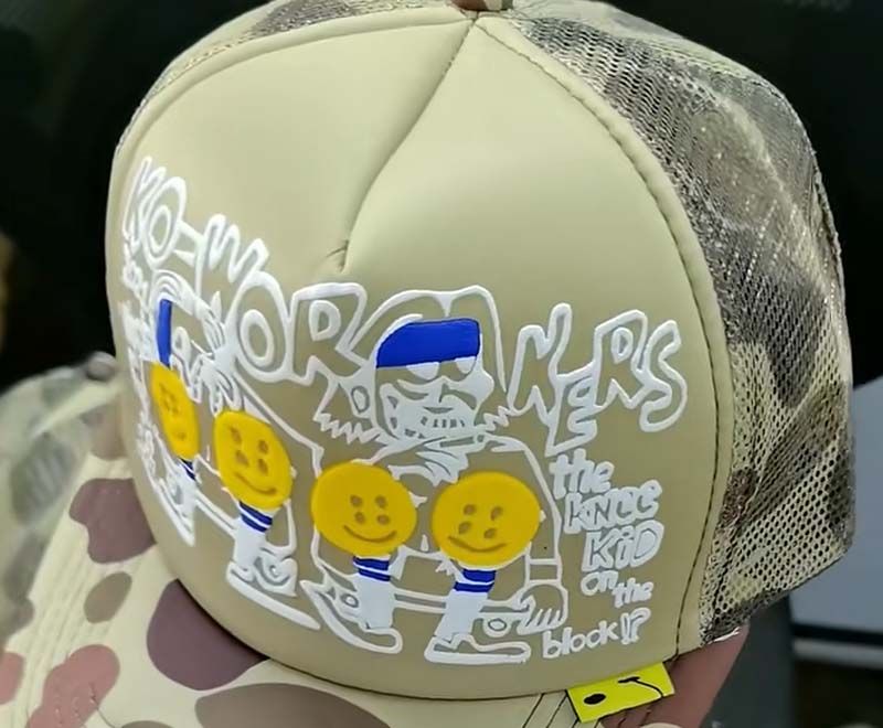 Front-panel logo on a flat-brim cap